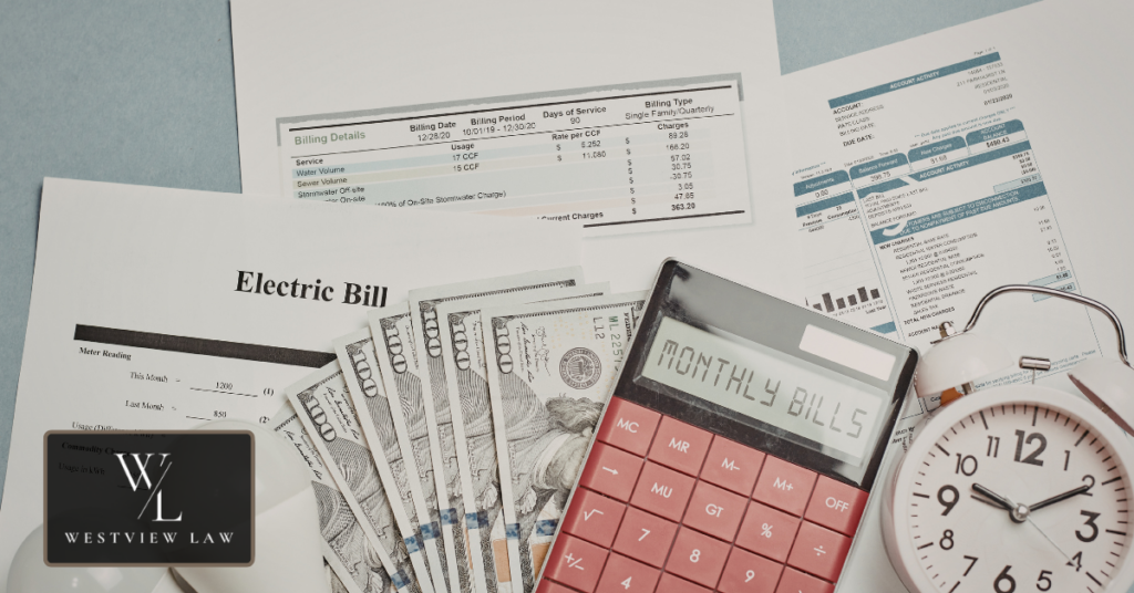 Legal bills and documents showing additional costs in discrimination lawsuits