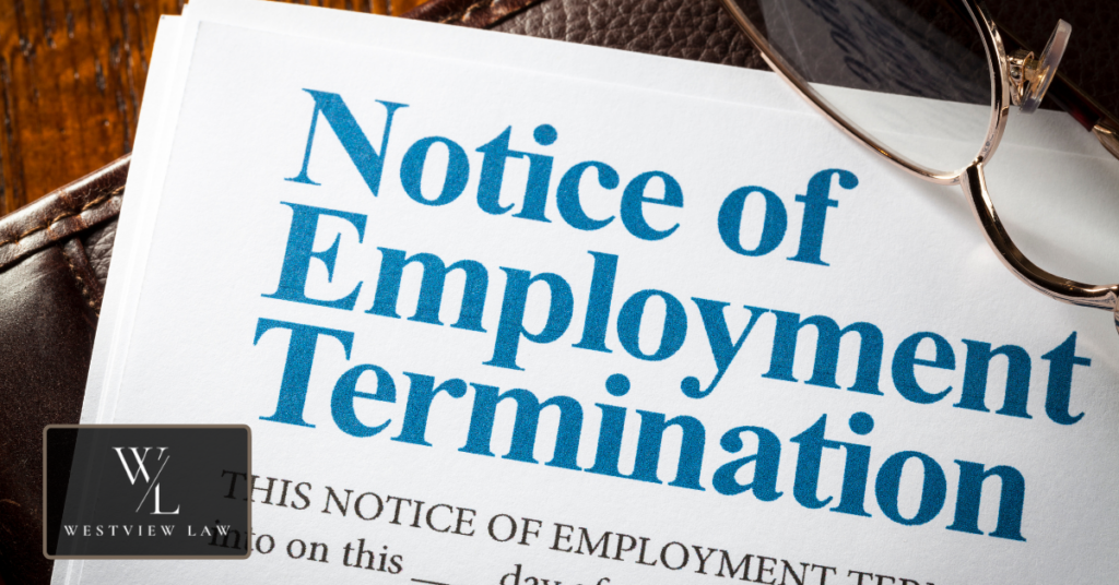 Employment attorney organizing evidence for wrongful termination lawsuit