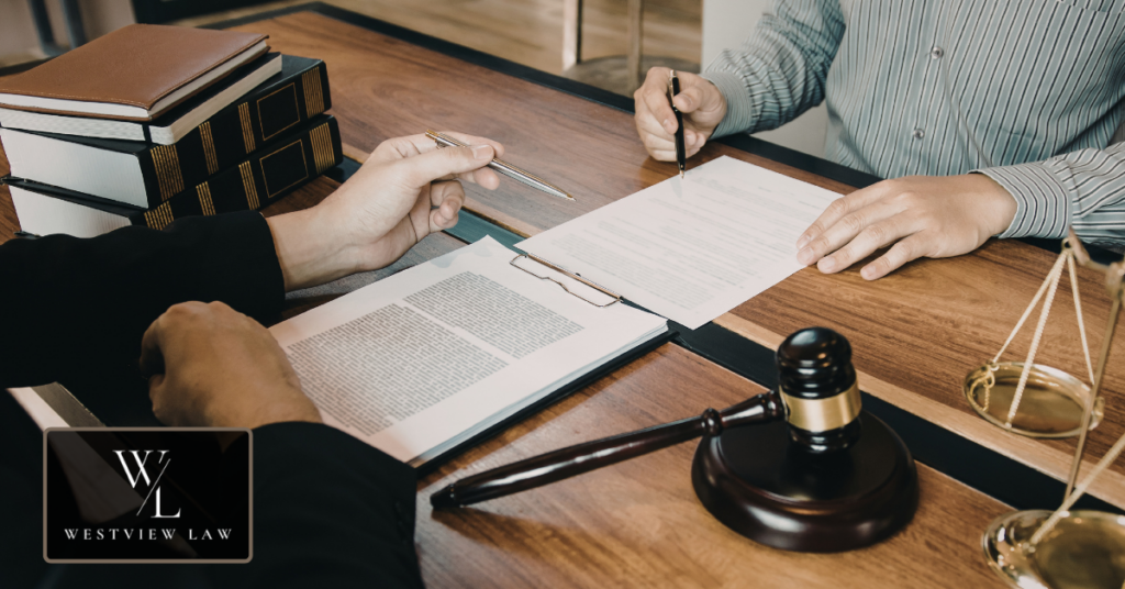 Employment lawyer organizing wrongful termination evidence and documents