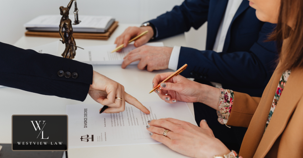 Employment attorney discussing an unpaid wage claim with a worker