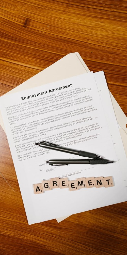 Paystub and employment papers used to audit unpaid California overtime