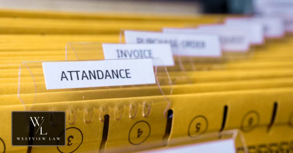 Manager analyzing attendance records and employee leave requests
