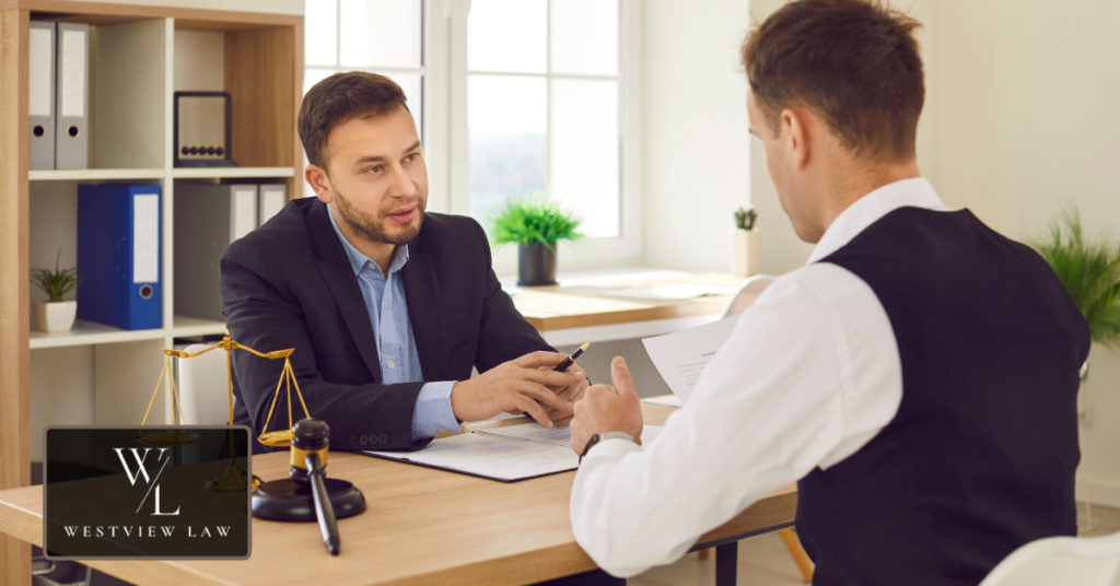 Employee consulting with an employment attorney about retaliation at work