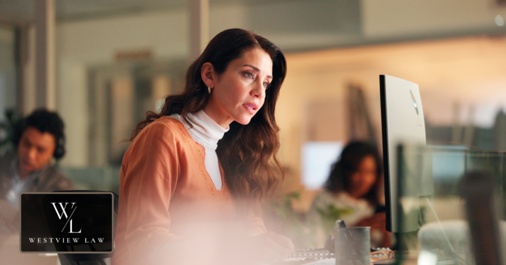Employee assessing workplace treatment after reporting misconduct