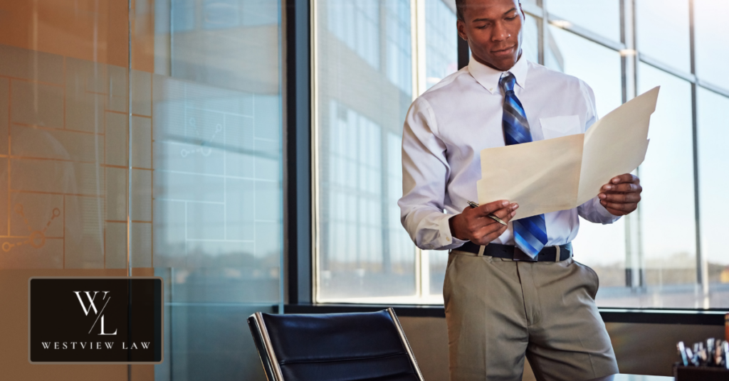 Employee organizing emails, performance reviews, and employment records