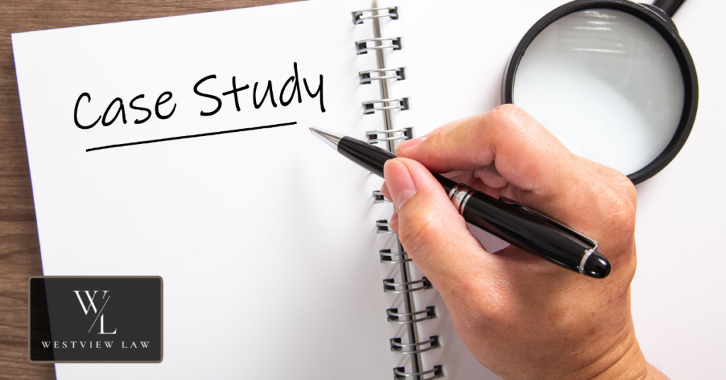 Hand writing the words Case Study on a spiral notepad next to a magnifying glass