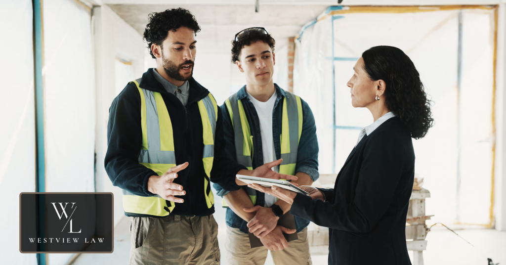 Employer meeting with employees to discuss workplace responsibilities and leave-related matters.